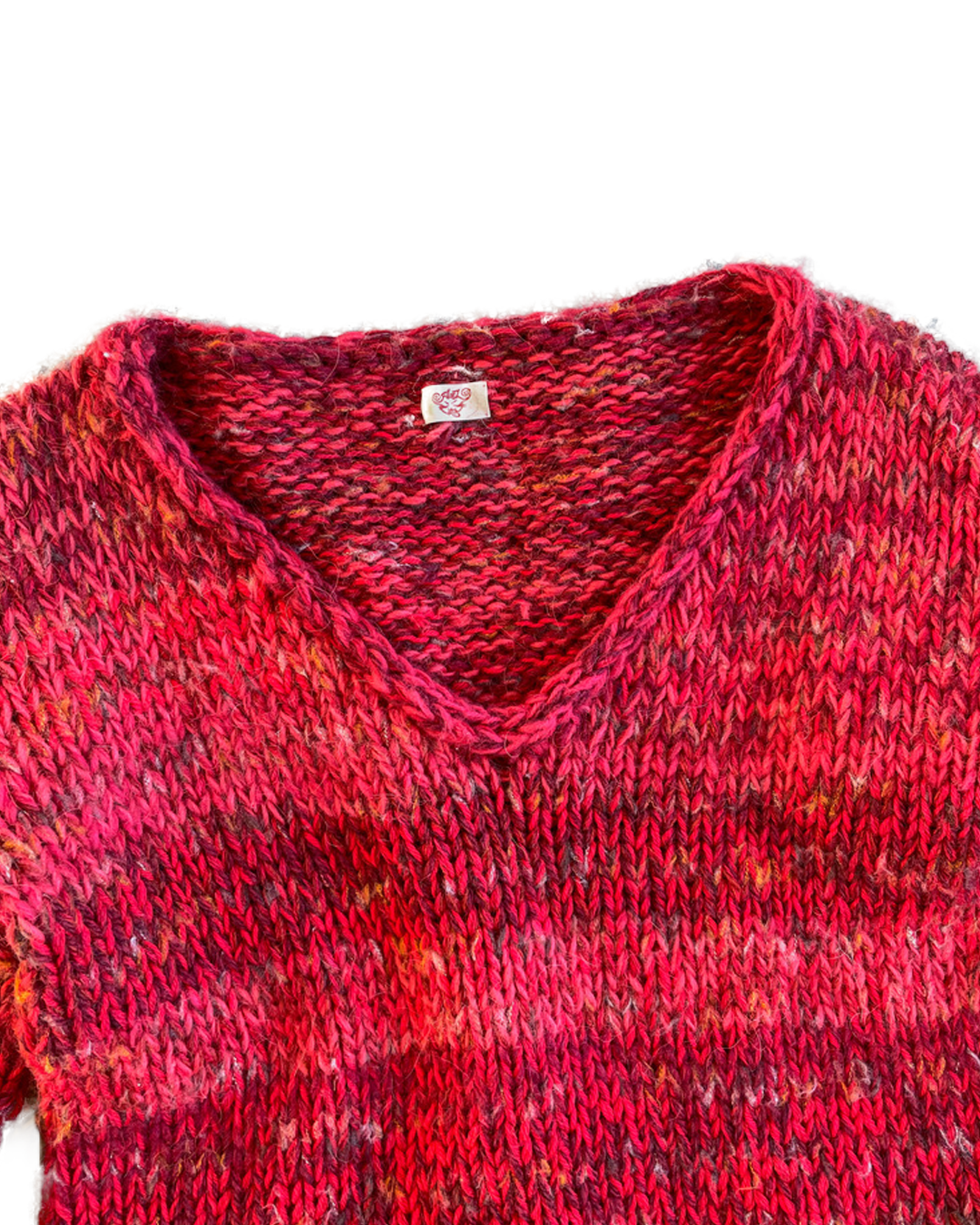 Red scrap sweater
