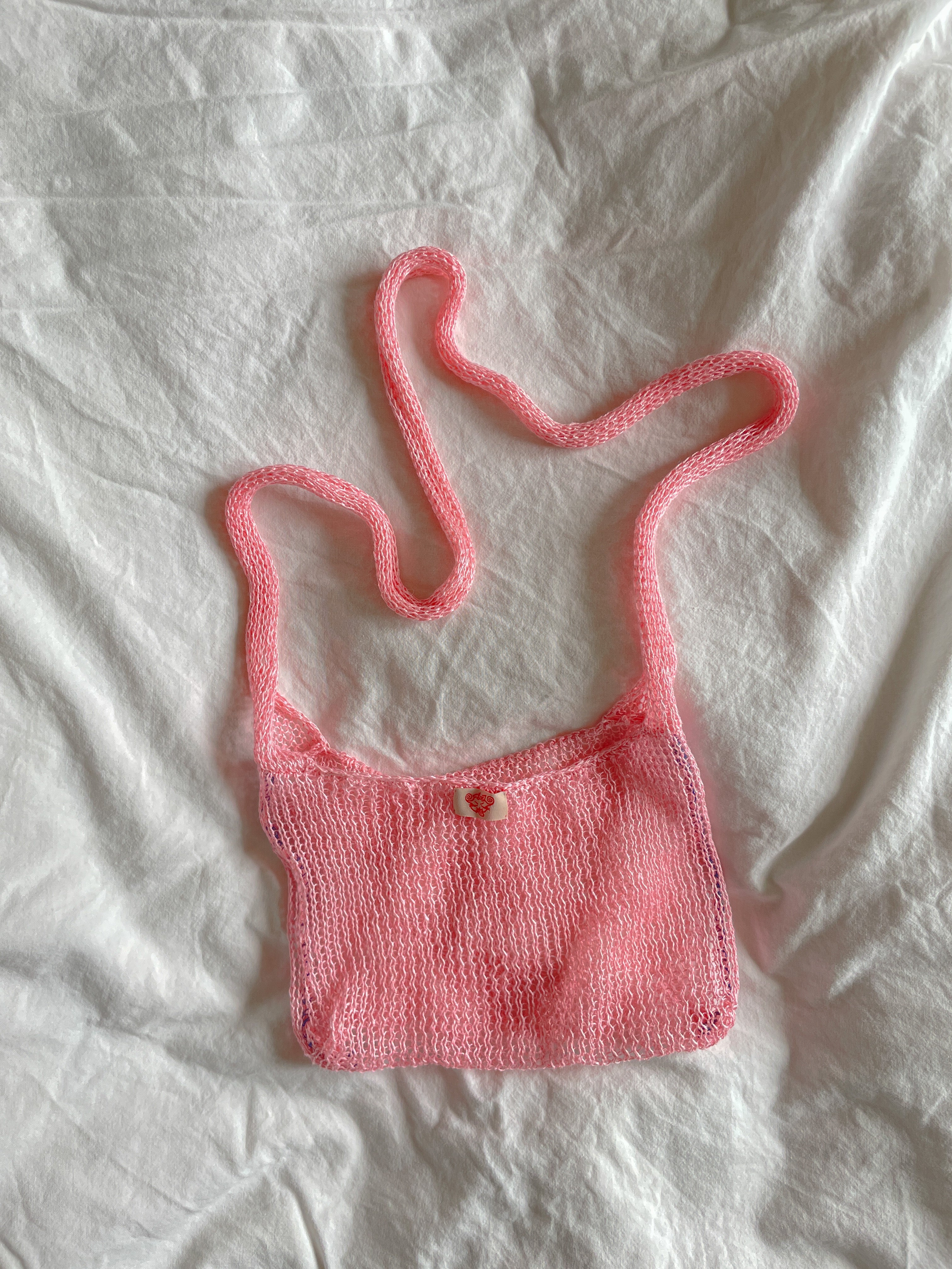 Pink crossbody mesh bag