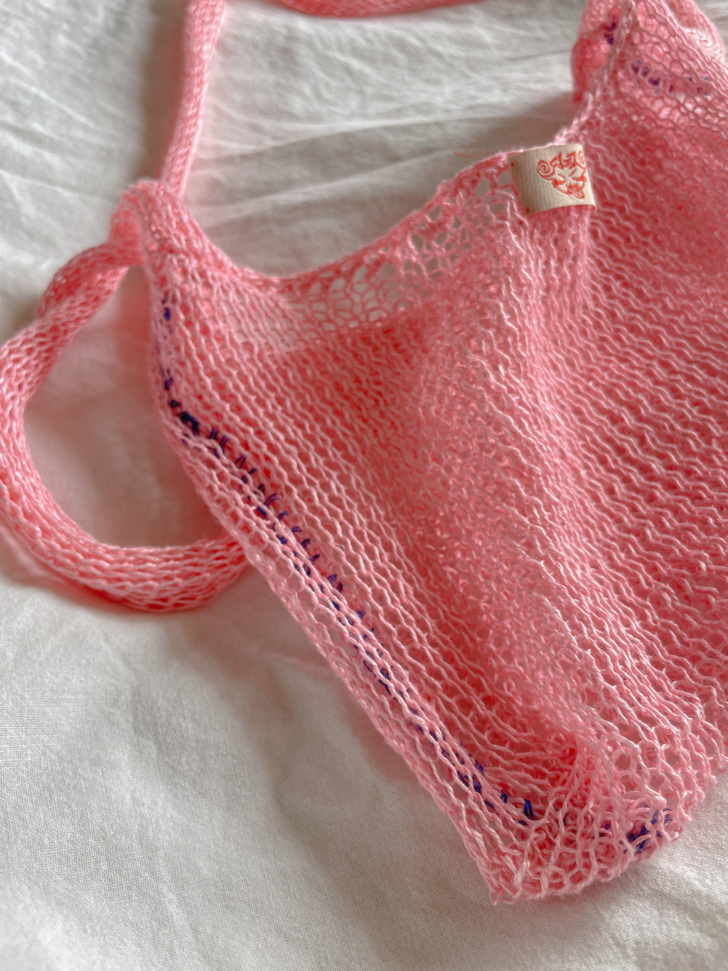 Pink crossbody mesh bag