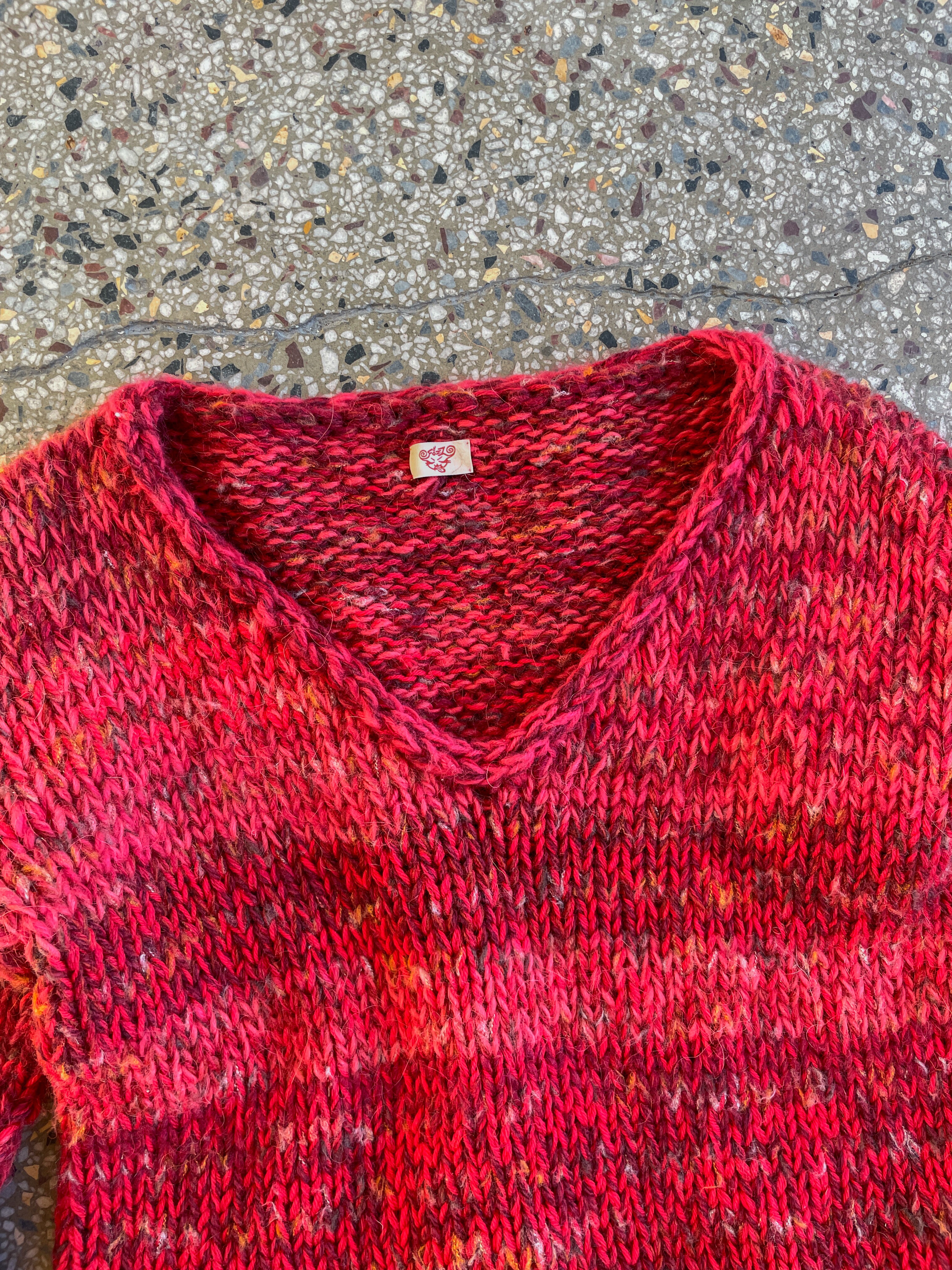 Chunky red scrap sweater